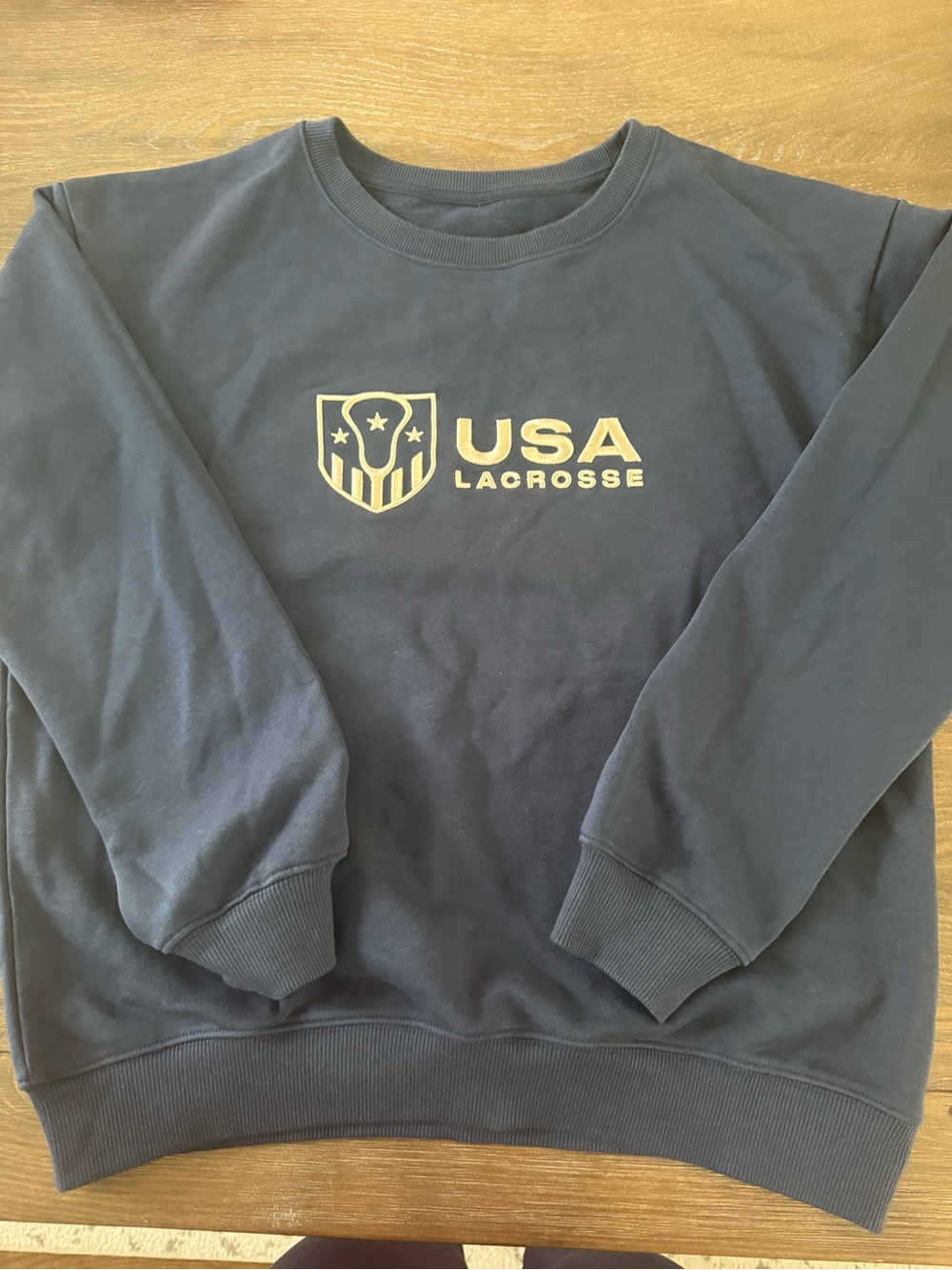 LaCrosse Women's Navy Sweatshirt with Gold USA Lacrosse Emblem